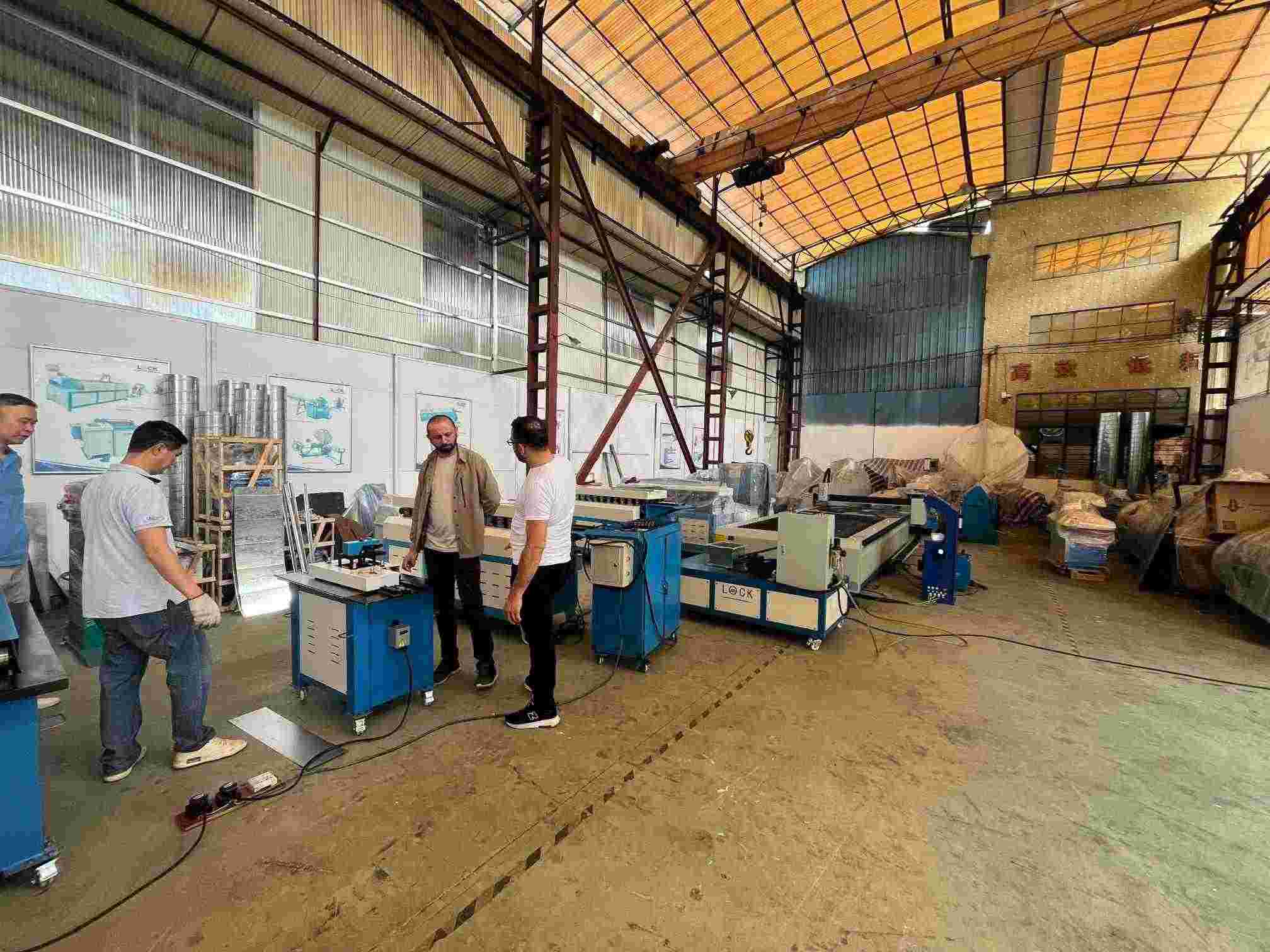 Clients from Romania make an inspection of high speed lockforming machine